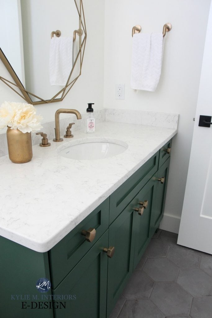 Kylie M Interiors Edesign, powder room with dark gray hexagon tile floor, green painted vanity, gold brass accents, fixtures, mirror. LG Minuet quartz white countertop