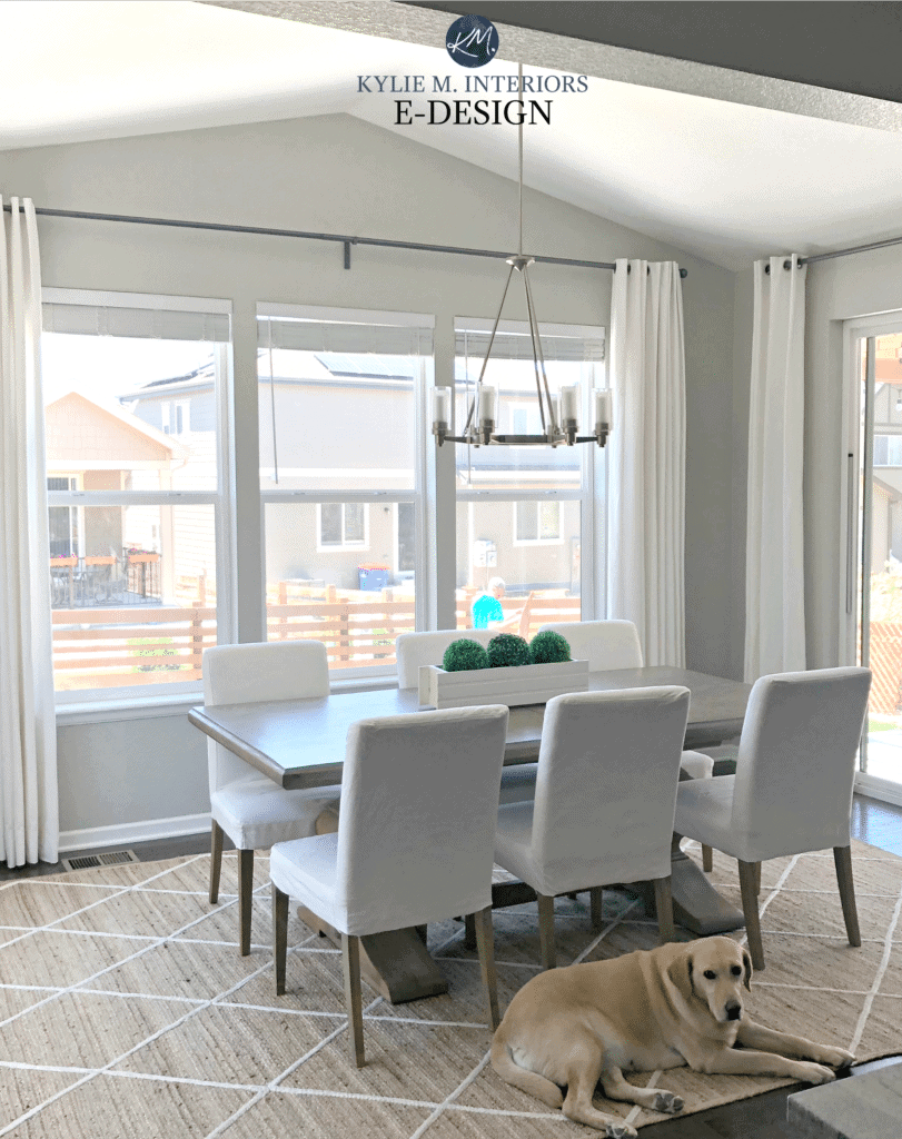 Sherwin Williams Repose Gray, best warm gray. Cream drapes, dining room with small vaulted ceiling. Transitional style. Kylie M Interiors Edesign, online paint color consulting advice