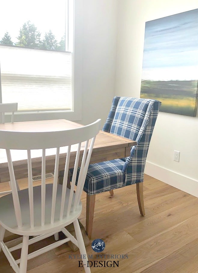 Upholstered blue and white dining chair and white spindle back chair, white oak flooring. Kylie M Interiors Edesign, online paint colour consulting
