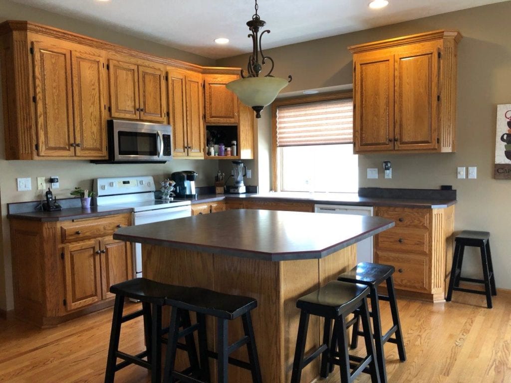 oak kitchen cabinets stained, not painted, before new countertop and backsplash (2)