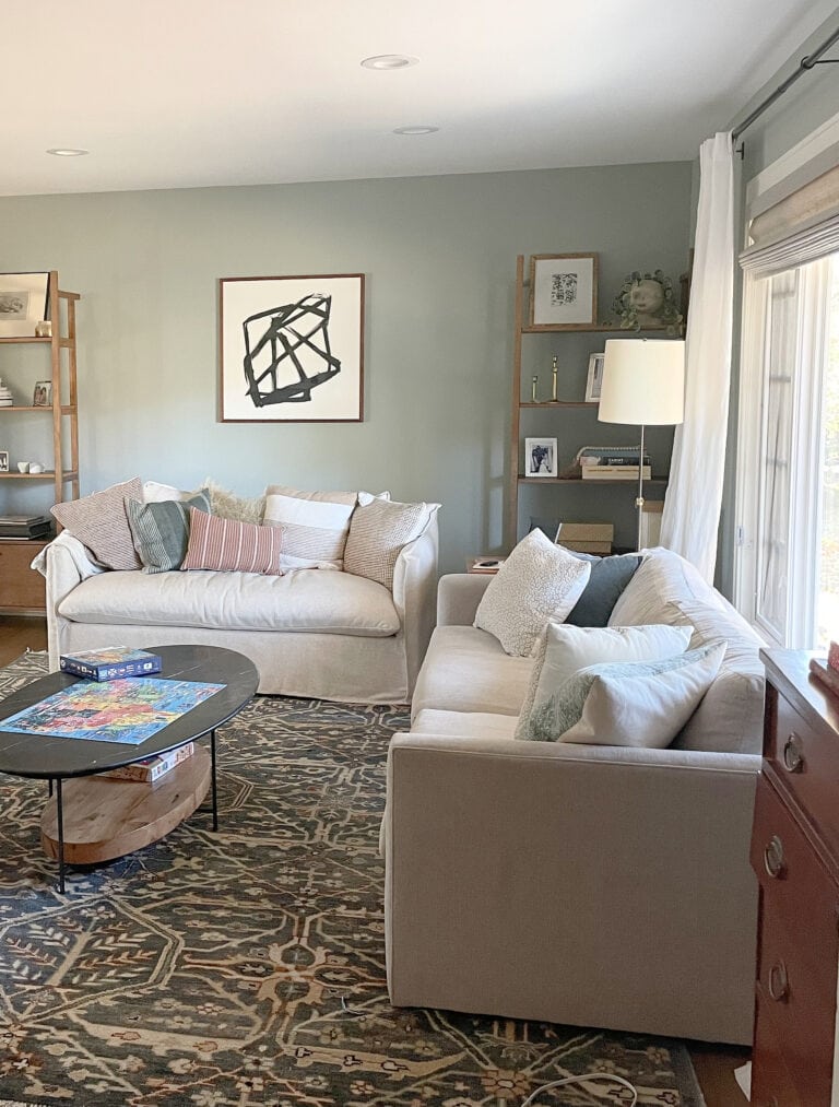 Benjamin Moore Imperial Gray in living room, neutral sofas, home decor, best blue green gray blend paint color. Kylie M Edesign client photo