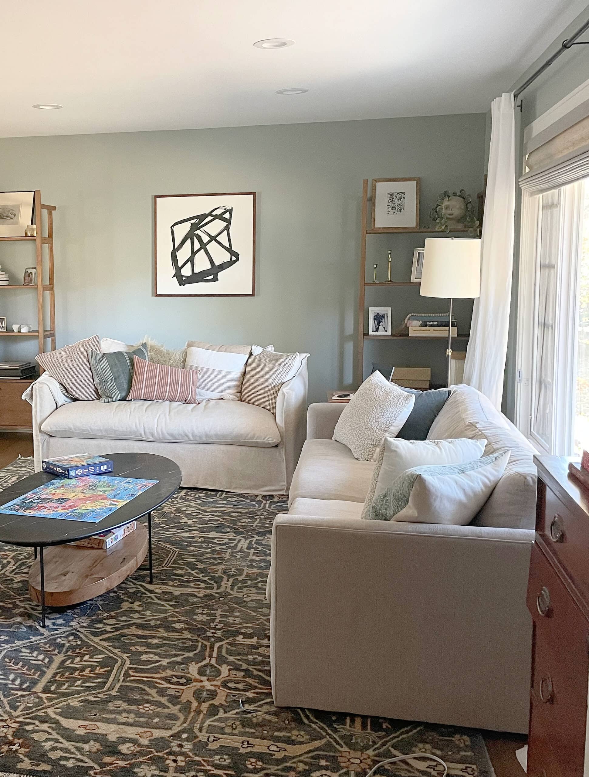Benjamin Moore Imperial Gray in living room, neutral sofas, home decor, best blue green gray blend paint color. Kylie M Edesign client photo