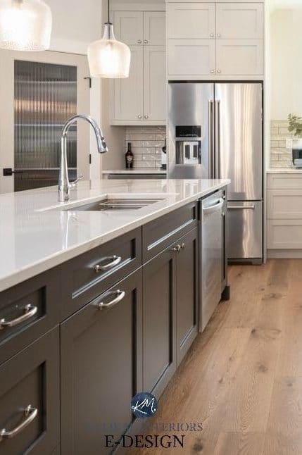 Kitchen island painted a dark gray green with Brittanica Warm quartz countertop, warm gray cabinets. Kylie M Interiors Edesign, online paint color consultant