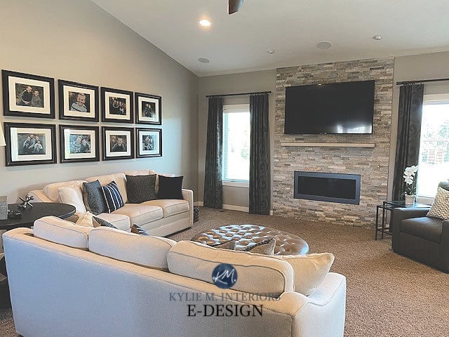 Anew Gray living room, stacked ledgestone fireplace, gallery wall, beige carpet. Kylie M Interiors Edesign, online paint color consulting and blog advice