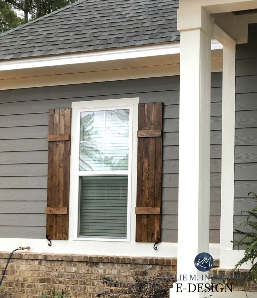 Exterior, Sherwin Williams Gauntlet Gray, gray roof. Wood shutters minwax, brown brick, white trim. Kylie M Interiors Edesign, online paint color consulting