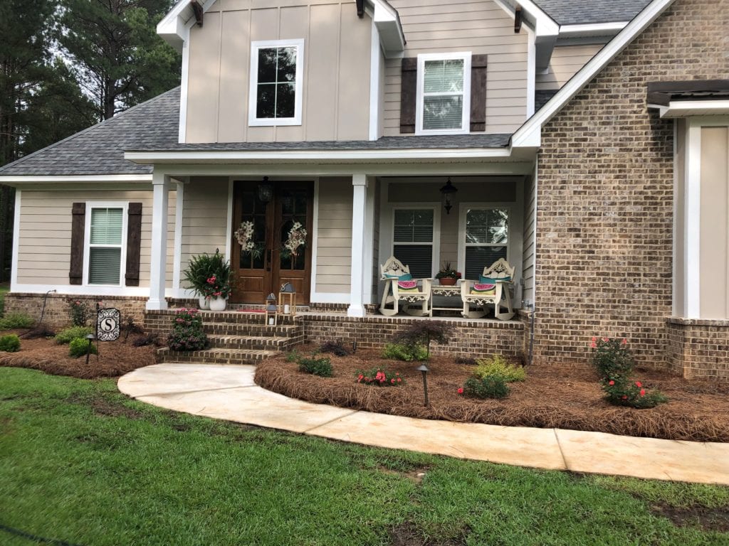 Exterior before painted. Benjamin Moore Stone Hearth. Separate garage.