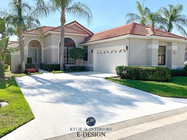 Exterior, red terra cotta tile orange roof with greige stucco and off-white trim and garage door. Kylie M Interiors Edesign, online paint colour consultant. Best exterior paint colors