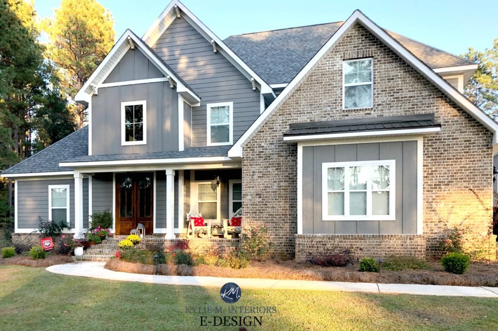 Exterior siding, Sherwin Williams Gauntlet Gray, Pure White trim, brown brick gray roof, wood shutters minwax. Kylie M Interiors Edesign, online paint colour coach advice