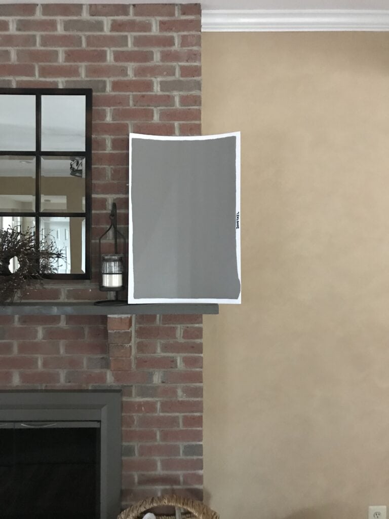 Sherwin Williams Dovetail dark warm gray paint color accent for red brick fireplace