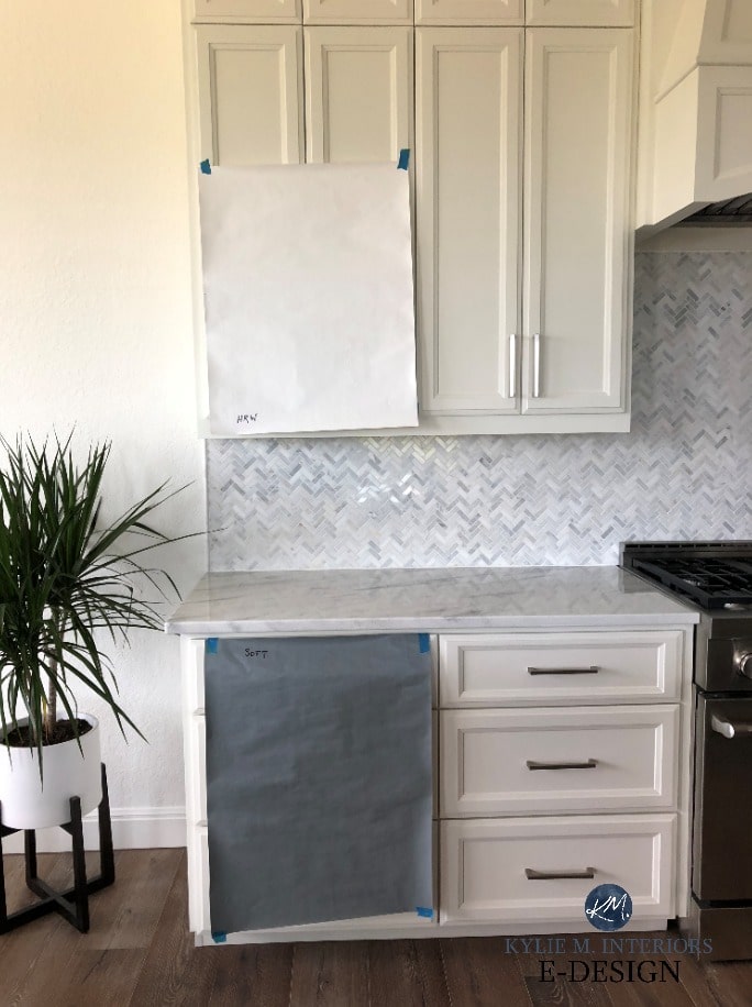 The best paint colours for cabinets, white, High Reflective White, Sherwin Williams with marble herringbone backsplash, countertop. Kylie M Interiors Edesign, online paint colour advice and consulting
