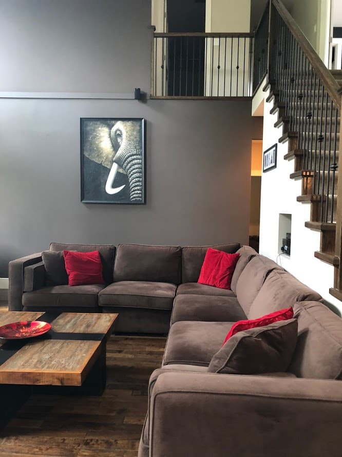 BEFORE DOING REMODEL, open layout dark living room