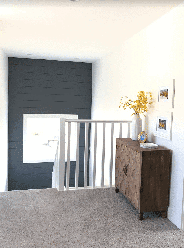 Landing of staircase, shiplap feature wall, Sherwin Web Gray and Pure White, warm gray carpeted stairs. Kylie M Interiors Edesign, online paint color consultant, diy decorating ideas