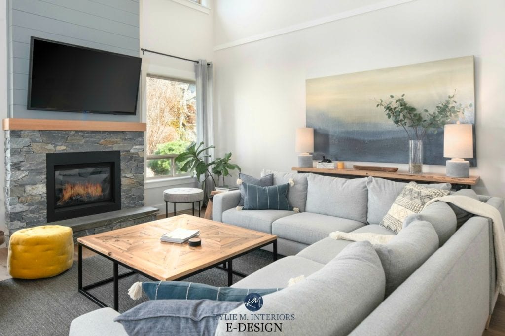 Living room vaulted ceiling, stone and shiplap fireplace with TV, off-white greige walls decor in grays, greens and blues. Kylie M Interiors Edesign, online paint colour. DIY Decorating and Design ideas blogger
