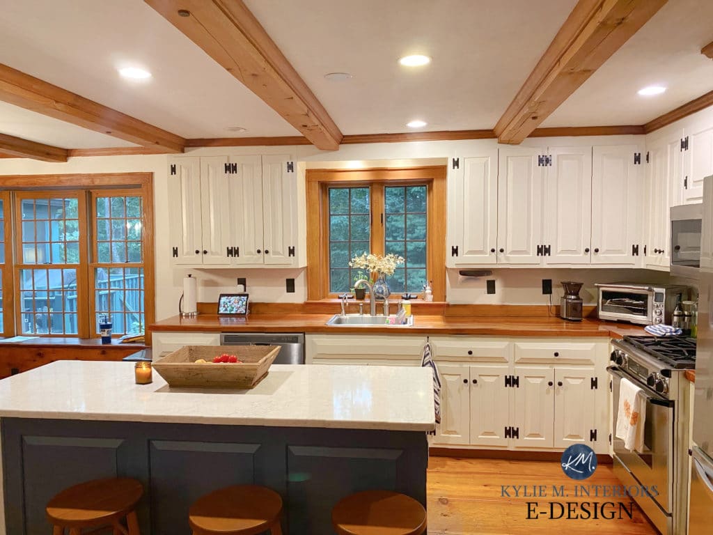 Benjamin Moore Navajo White painted cream, off white cabinets with wood trim, orange oak floor and kitchen island. Butcher block. Kylie M Interiors Edesign (1)