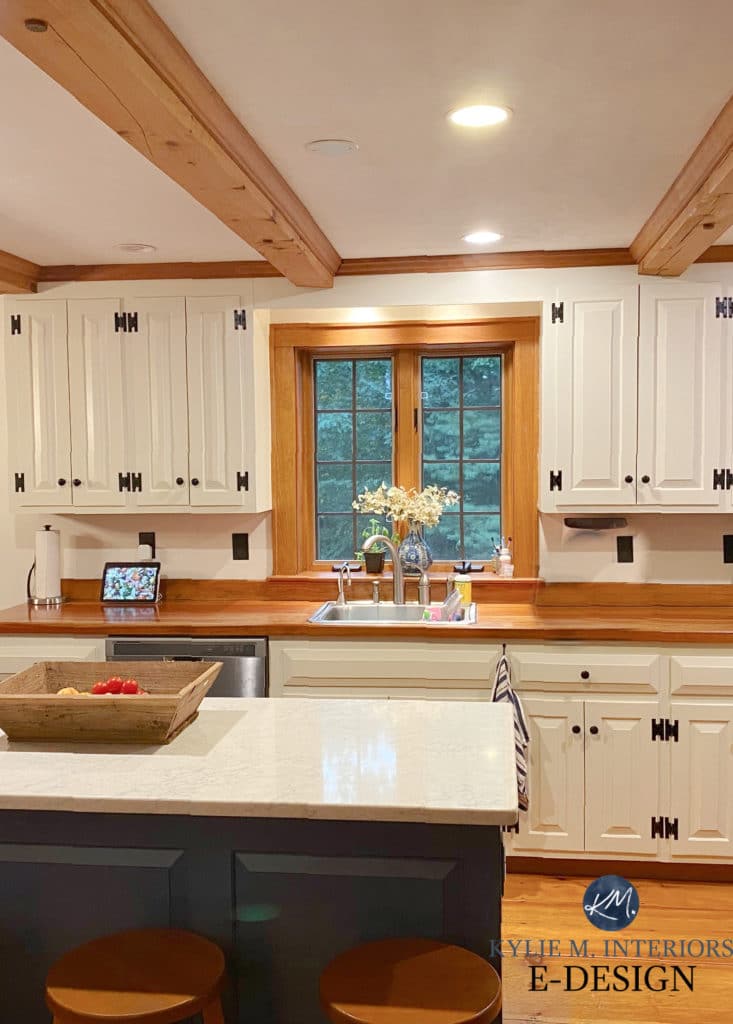 Benjamin Moore Navajo White painted cream, off white cabinets with wood trim, orange oak floor and kitchen island. Butcher block. Kylie M Interiors Edesign (2)