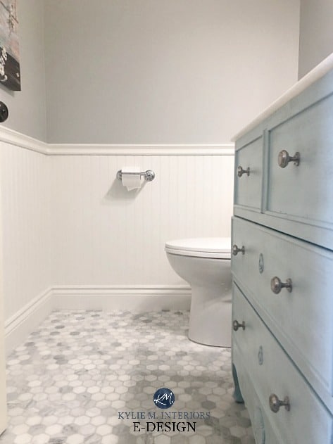 Small bathroom or powder room ideas. Marble hexagon floor, blue green vanity, white wainscoting, Stonington Gray paint color. Kylie M Interiors Edesign
