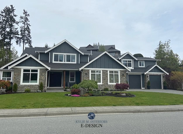 Dark gray exterior, white trim, stone, roof, black garage doors. Kylie M Interiors Edesign, online paint color consult. Southern exposure