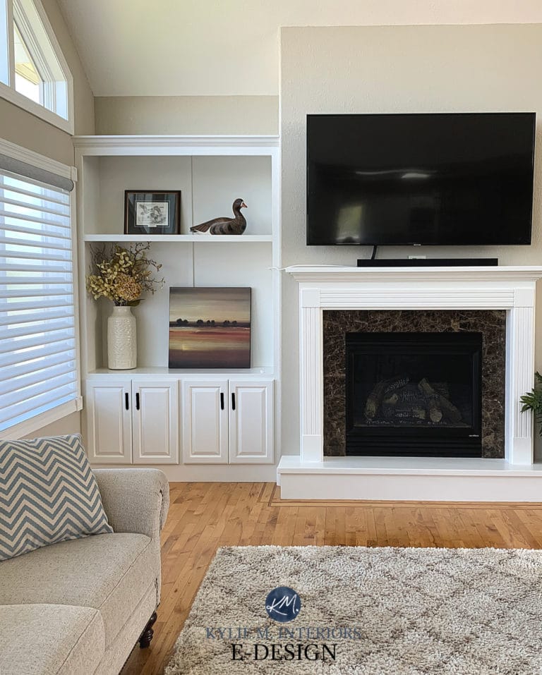 Best neutral beige, tan paint colour, Sherwin Sandbar. Living room, built-ins, fireplace, vaulted ceiling, Alabaster trim. Kylie M Interiors Edesign