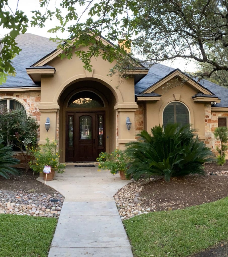 Exterior with yellow orange brown stone BEFORE Edesign with Kylie M Interiors