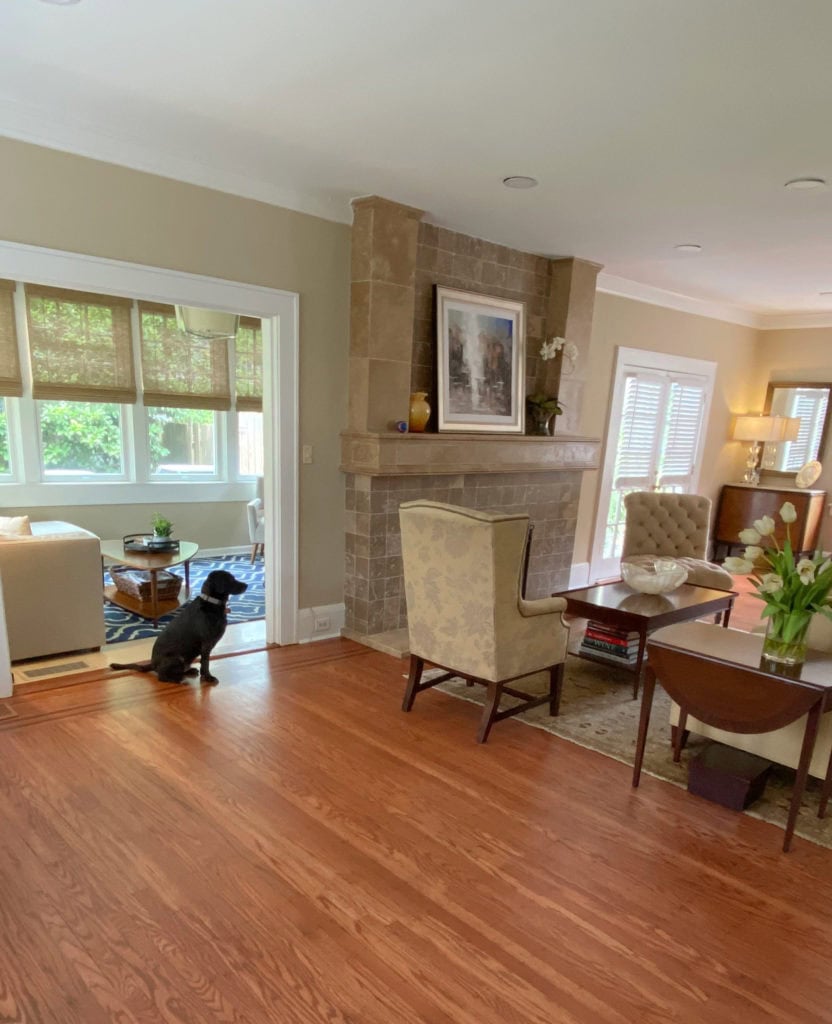 Living room, travertine stone fireplace, Benjamin Moore best neutral tan or beige paint colour, Shaker Beige. Client photo for Kylie M Interiors diy
