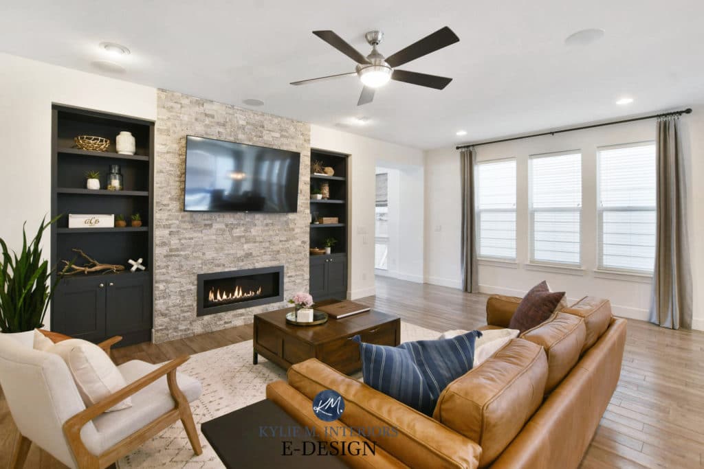 Living room, stacked stone fireplace, tv, builtins painted Benjamin Cheating Heart, Pure White walls,cognac leather. Kylie M Interiors Edesign, online paint color consultant (3)