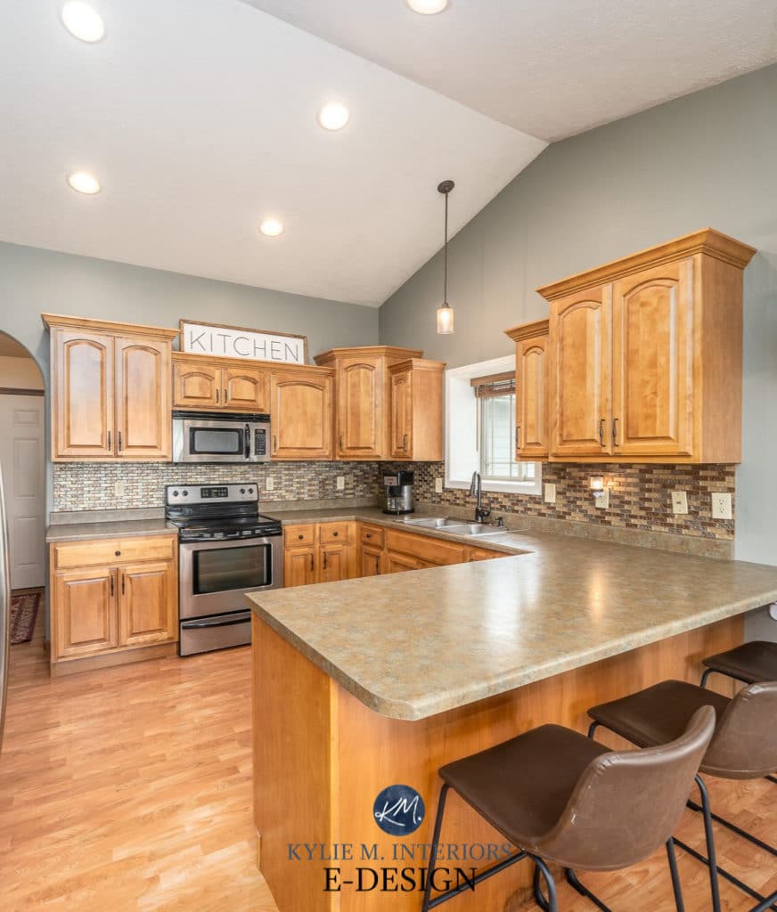 Oak kitchen cabinets, update ideas, wood trim, Arctic Shadows green paint colour, slate look laminate countertop. Kylie M Interiors Edesign, advice blog and home staging