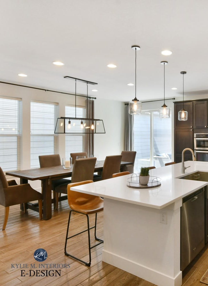Open layout dining room, kitchen dark wood cabinets, tile wood look floor. Sherwin Williams Pure White. Paint color consulting Kylie M Interiors Edesign (10)