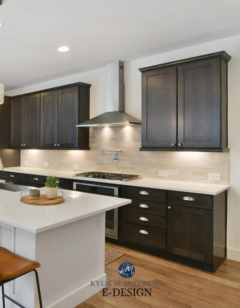 Open layout dining room, kitchen dark wood cabinets, tile wood look floor. Sherwin Williams Pure White. Paint color consulting Kylie M Interiors Edesign (13)