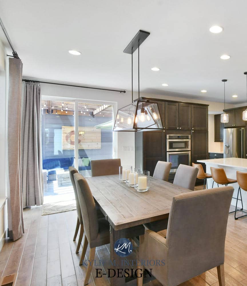 Open layout dining room, kitchen dark wood cabinets, tile wood look floor. Sherwin Williams Pure White. Paint color consulting Kylie M Interiors Edesign (2)