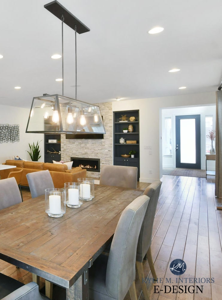 Open layout dining room, kitchen dark wood cabinets, tile wood look floor. Sherwin Williams Pure White. Paint color consulting Kylie M Interiors Edesign