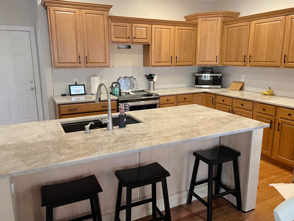 oak cabinets in kitchen with taj royale or like taj mahal quartz countertops (2)