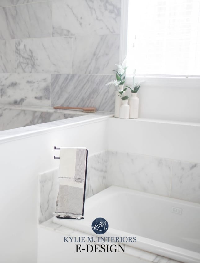 Bathroom walk in shower. Marble floor and walls in tile. Benjamin Moore Decorators White, best white paint color. Kylie M Interiors Edesign, online diy decorating and design advice blog