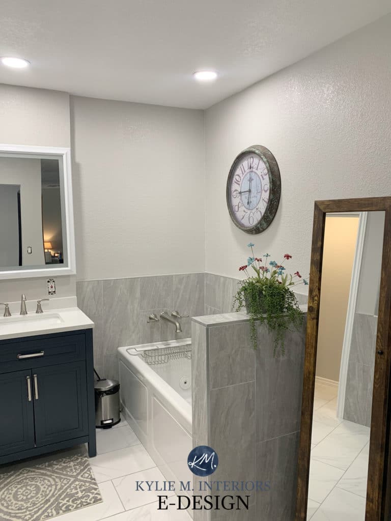 Benjamin Moore Nimbus with tile and bathtub in greige, taupe and warm gray tones. Kylie M Interiors online paint color consulting and advice blogger
