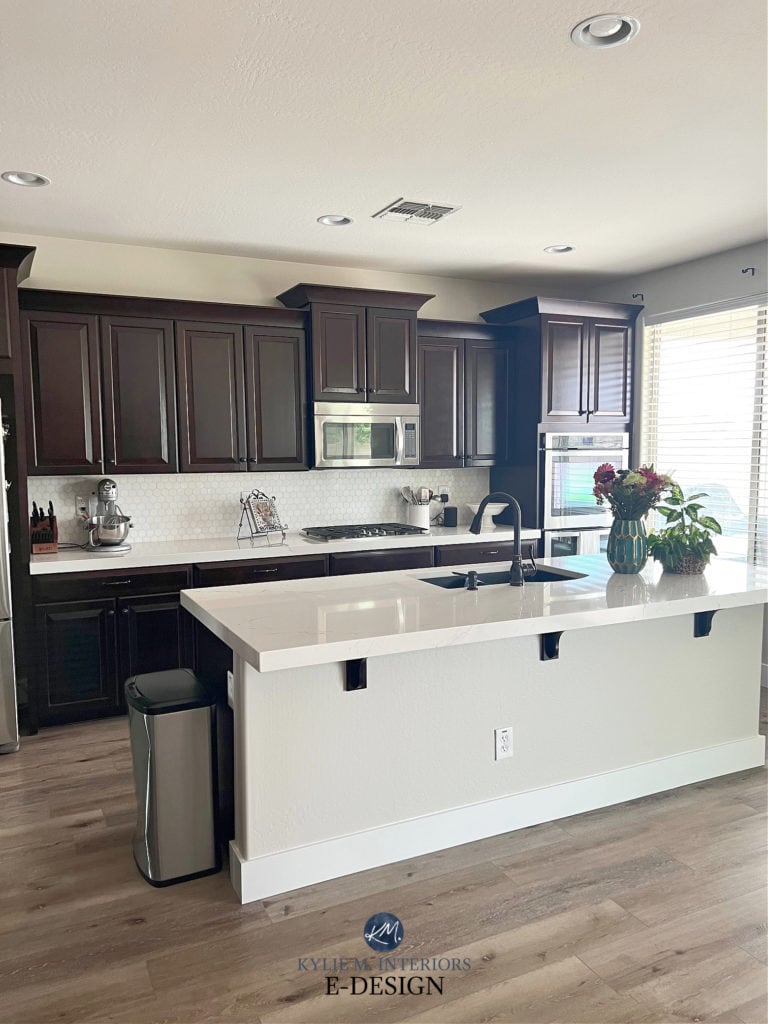 Dark cherry red stain wood cabinets, hexagon marble tile backsplash, INverness Frost Cambria off-white quartz countertop, wood floor, island, Kylie M Interiors