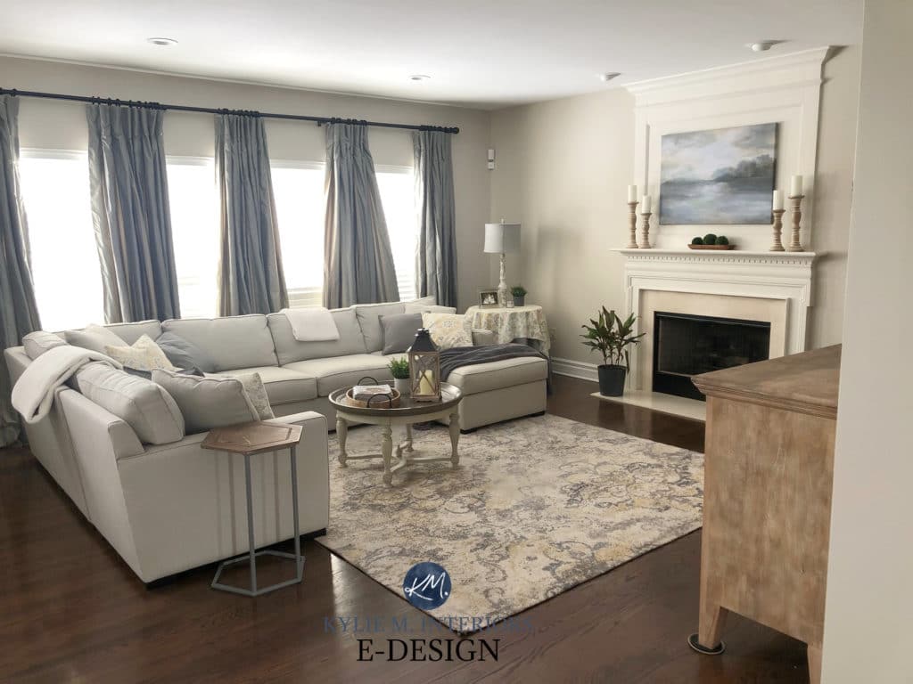 Livingroom with tan sectional, dark wood floor. Cream trim, Benjamin Moore Edgecomb Gray paint colour. Best neutral. Kylie M Edesign, interior decorating blogger