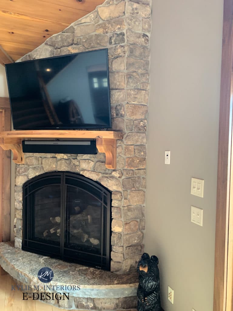 Sherwin Williams Tony Taupe, best beige paint color with stone fireplace and wood trim. Kylie M Interiors Edesign, diy advice blogger