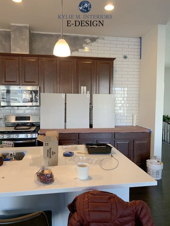 Warm gray or greige cabinet samples. Benjamin Moore Smoke Embers, Cumulus Cloud, London Fog. White subway tile, white quartz. Kylie M Interiors Edesign paint