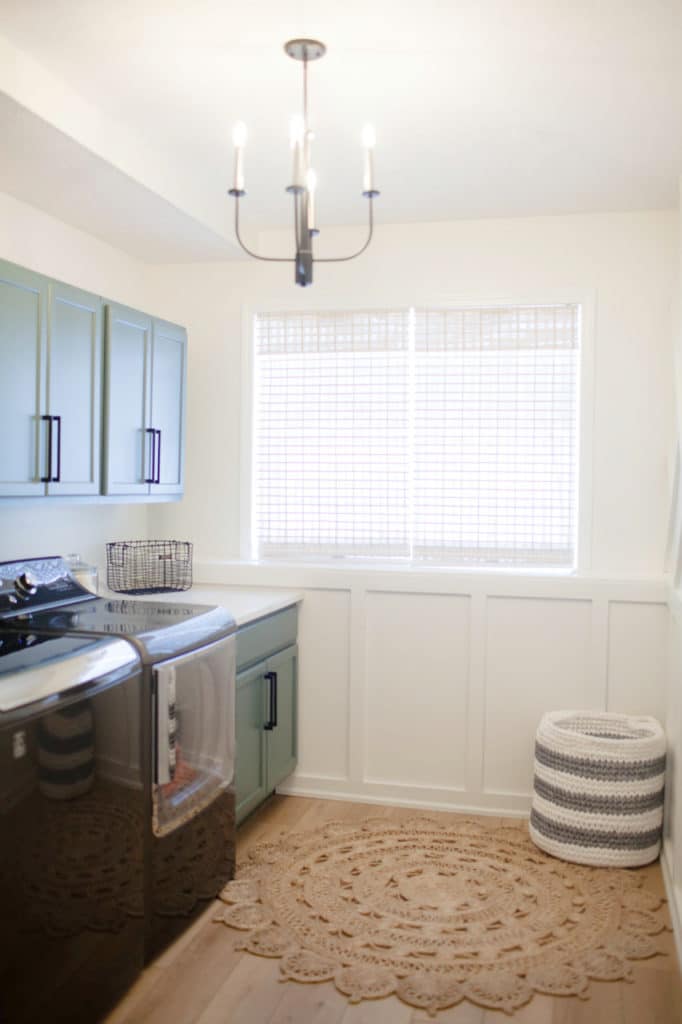 Laundry room diy updated. Green cabinets, White Dove walls, Benjamin Moore, board and batten. wood look floor. Kylie M Interiors Edesign, diy update ideas blogger