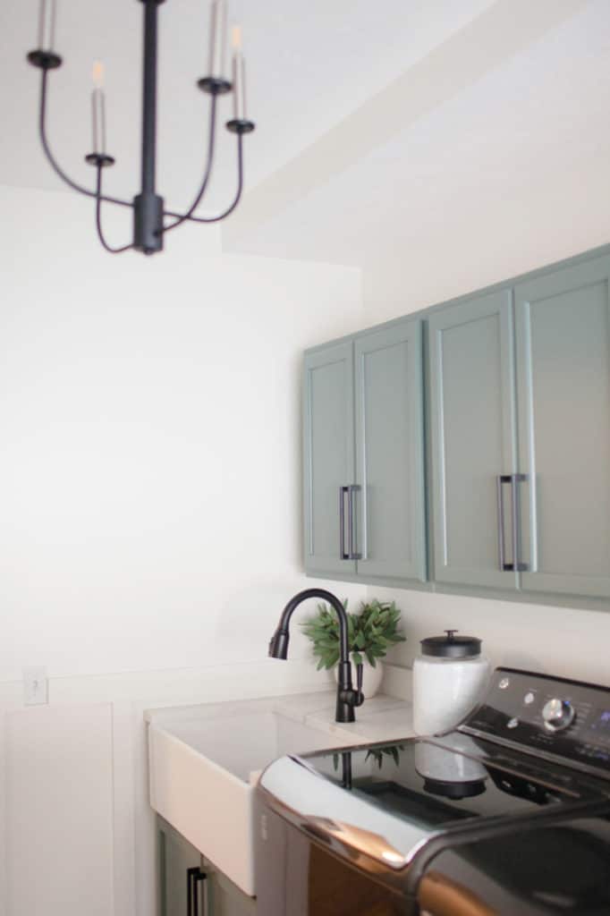 Laundry room, farmhouse sink, green cabinets, White Dove walls, Benjamin Moore. Kylie M Interiors Edesign, diy decor and update ideas