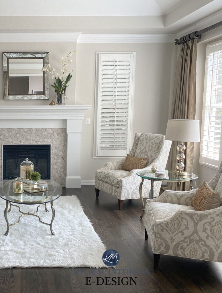 Accent chairs, dark wood floor in formal living room, travertine tile fireplace, white mantel. Edgecomb Gray, White Dove by Benjamin Moore. Kylie M Edesign, consultant and diy expert