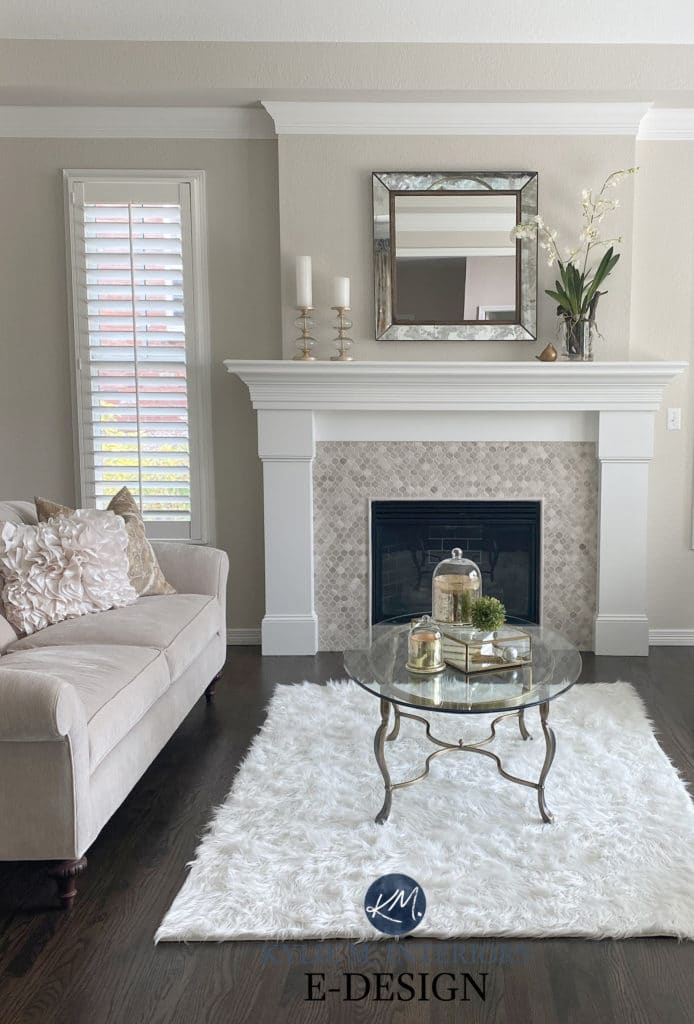 Formal living room fireplace, travertine tile surround, dark wood floor, taupe and beige furniture. Edgecomb Gray and White dove, Benjamin Moore. Kylie M Interiors Edesign