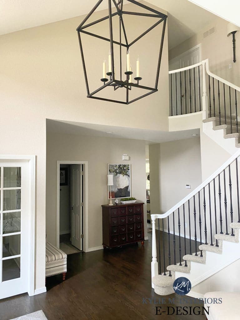 Two storey foyer or entryway, Benjamin Moore Edgecomb Gray, beige tan carpet on stairs, dark wood floor. Kylie M Interiors Edesign, consultant
