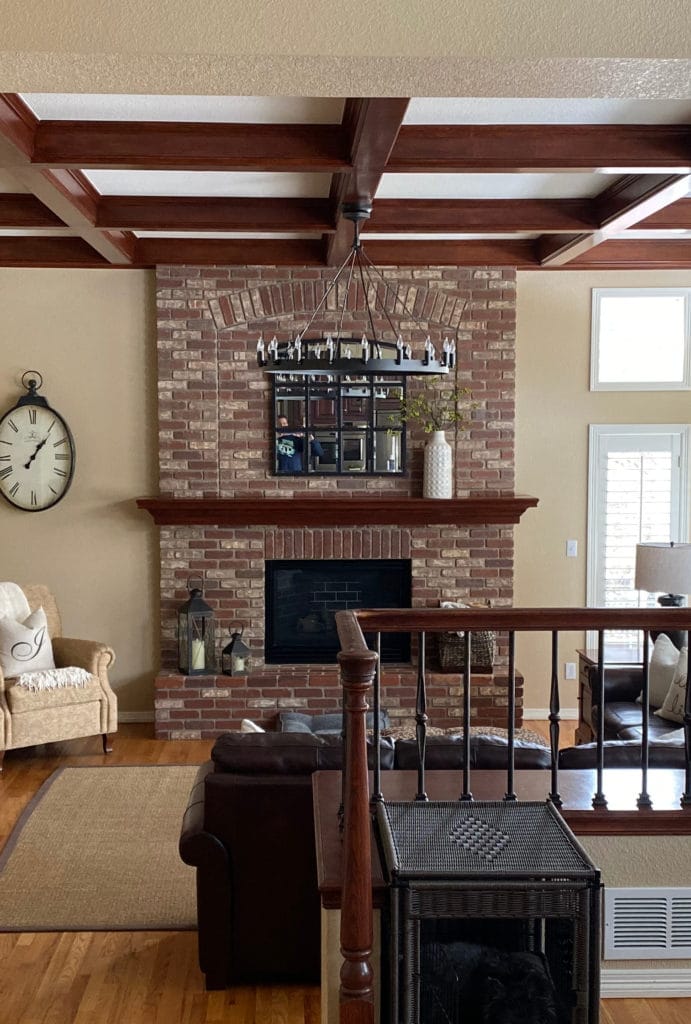 family room before, brick fireplace