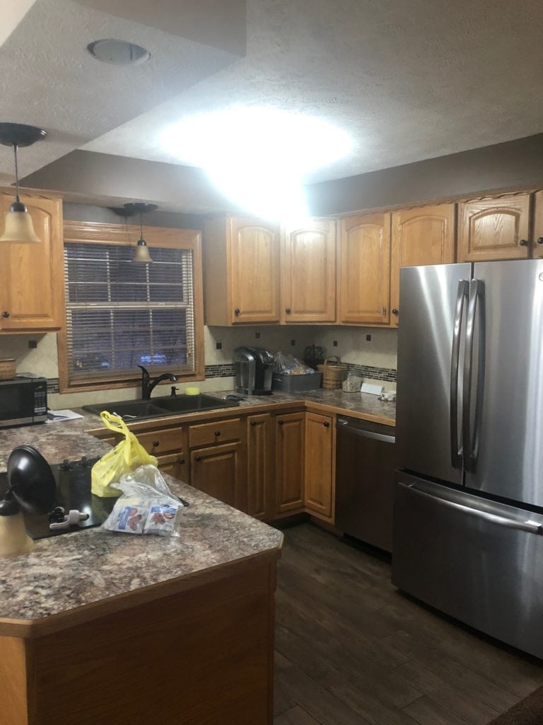 fireplace and kitchen before (3)
