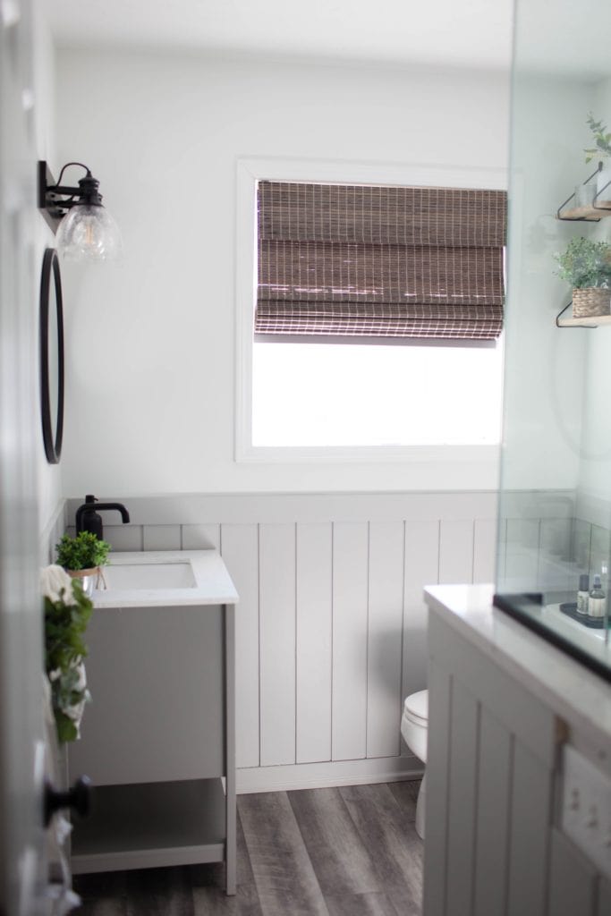 Sherwin Williams Pure White and Light French Gray board and batten beadboard, small bathroom ideas, gray vanity. Kylie M Interiors Edesign, diy updates