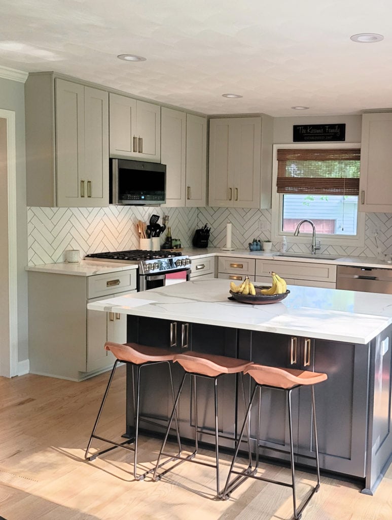 Benjamin Moore Revere Pewter, grey paint colour on painted cabinets. Client photo. White quartz countertop and subway tile backsplash. Kylie M Interiors Edesign