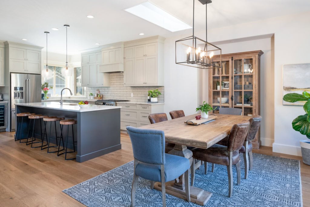 Benjamin Moore Revere Pewter kitchen cabinets, warm gray. Urbane Bronze Sherwin Williams island, white oak floor. Open concept. Kylie M Interiors edesign