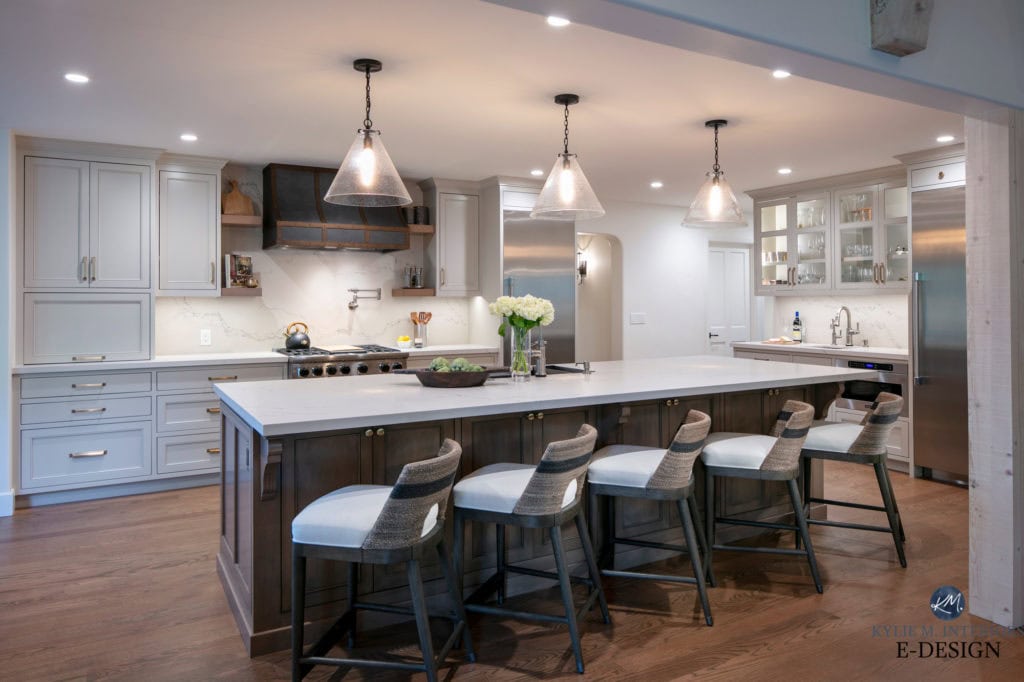 Kitchen with Benjamin Moore Revere Pewter cabinets, darkened. Wood island, quartz countertops, Caesarstone Statuario Nuvo. Wood floor. custom range hood. Kylie M Interiors Edesign, diy