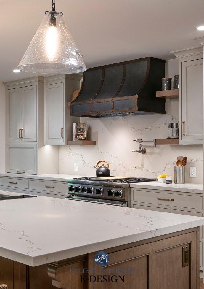 Kitchen with custom metal zinc range hood. Cabinets painted Benjamin Moore Revere Pewter darkened, Caesarstone Statuario Nuvo white quartz countertop, wood island & red oak floor. Kylie M Edesign (1)