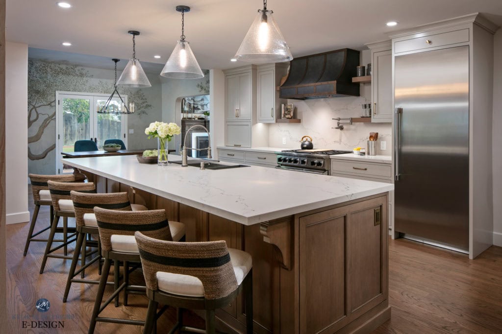 Kitchen with mural in eating nook. Cabinets painted Benjamin Moore Revere Pewter, warm gray, darkened, Caesarstone Statuario Nuvo white quartz countertop, wood island & floor. Kylie M Edesi